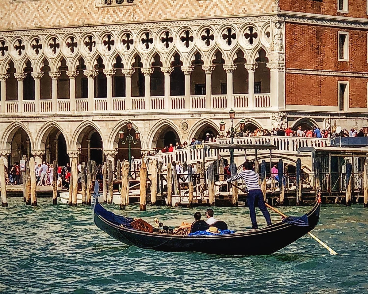 A Gondolier Guiding His Gondola in the Grand Canal