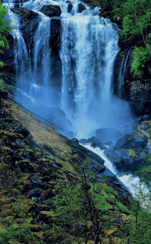 The Mist and Black Rocks of The Black Forest Waterfall